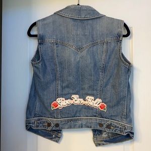 “Give ‘em hell” denim vest